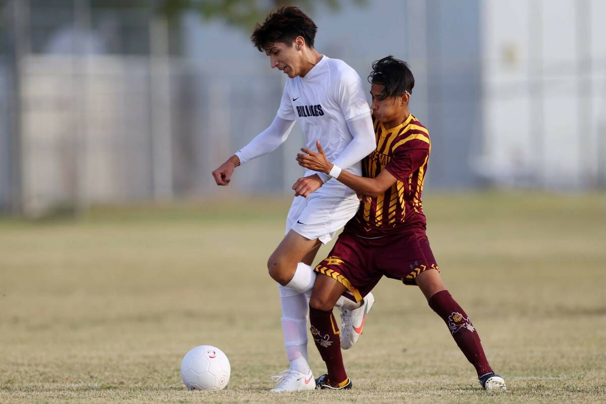 Eldorado's Jorge Horta (5) defends against Centennial's Nathan Gamboa (11) during the first hal ...