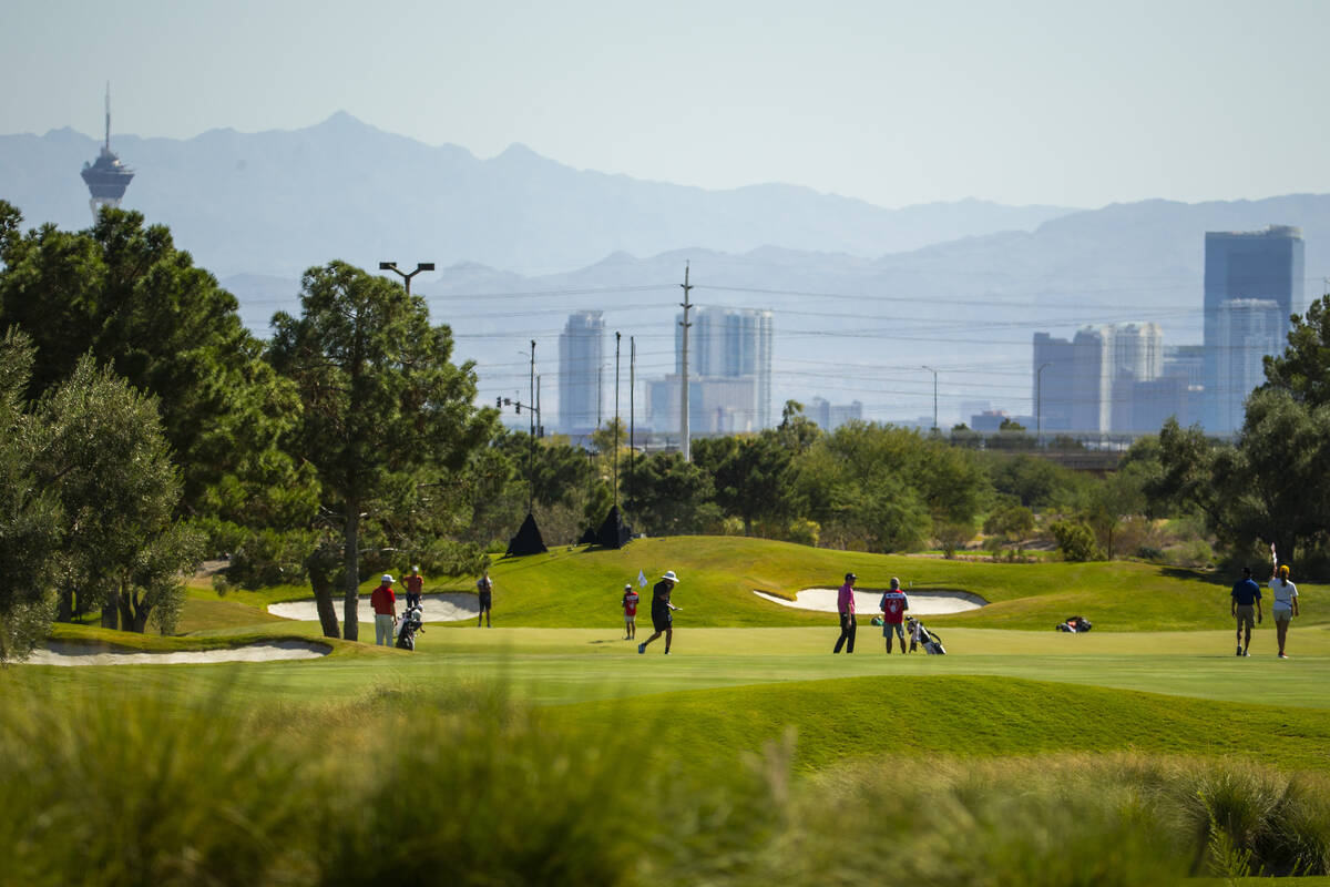 Golfers get a view of the city on the front nine during the final round of Shriners Hospitals f ...
