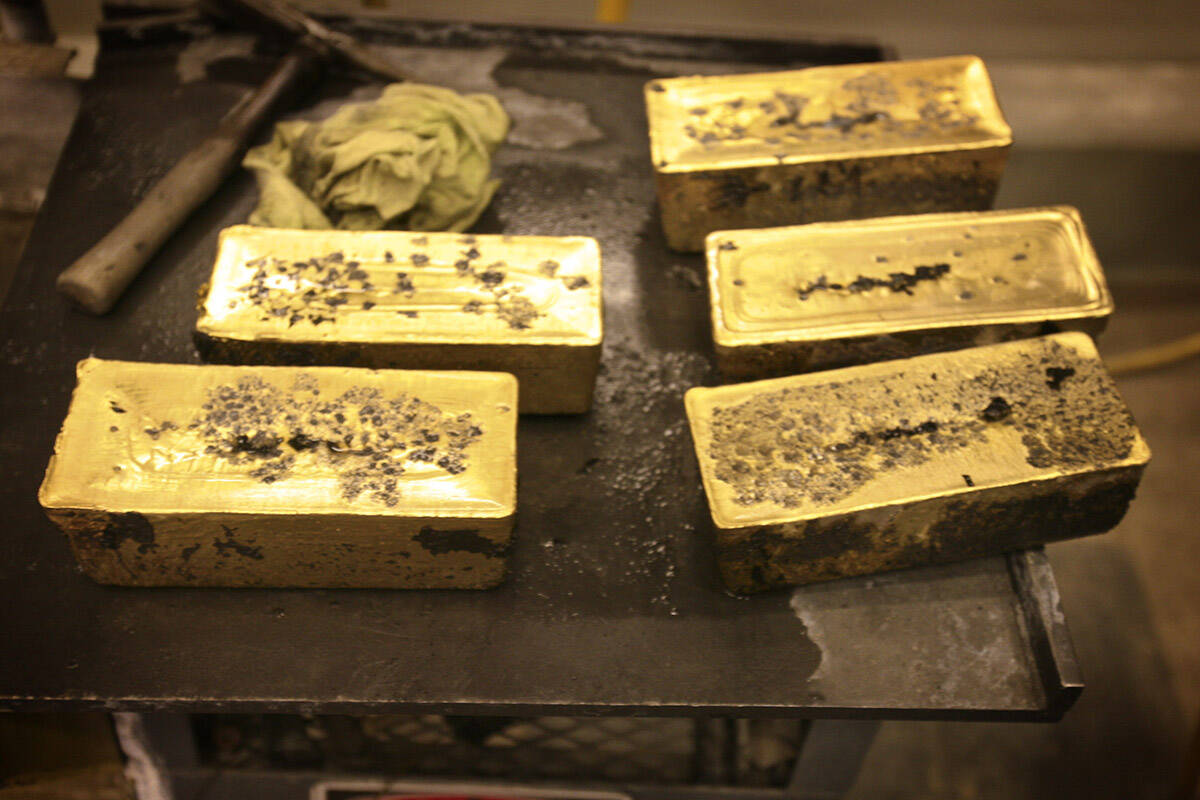 Sixty-pound bars of gold are seen at Barrick Gold Corp Pipeline refinery, located about 70 mile ...