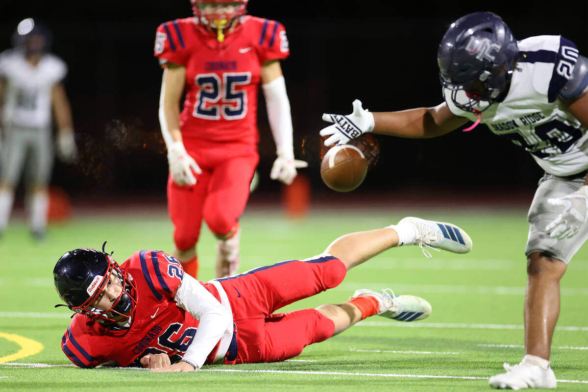 Coronado's Logan Chaney (26) falls to the ground after breaking up a pass intended for Shadow R ...