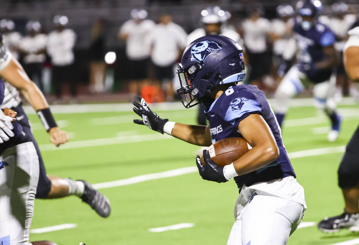 Canyon Springs' Darion Smith (6) runs the ball against Palo Verde during the first half of a fo ...