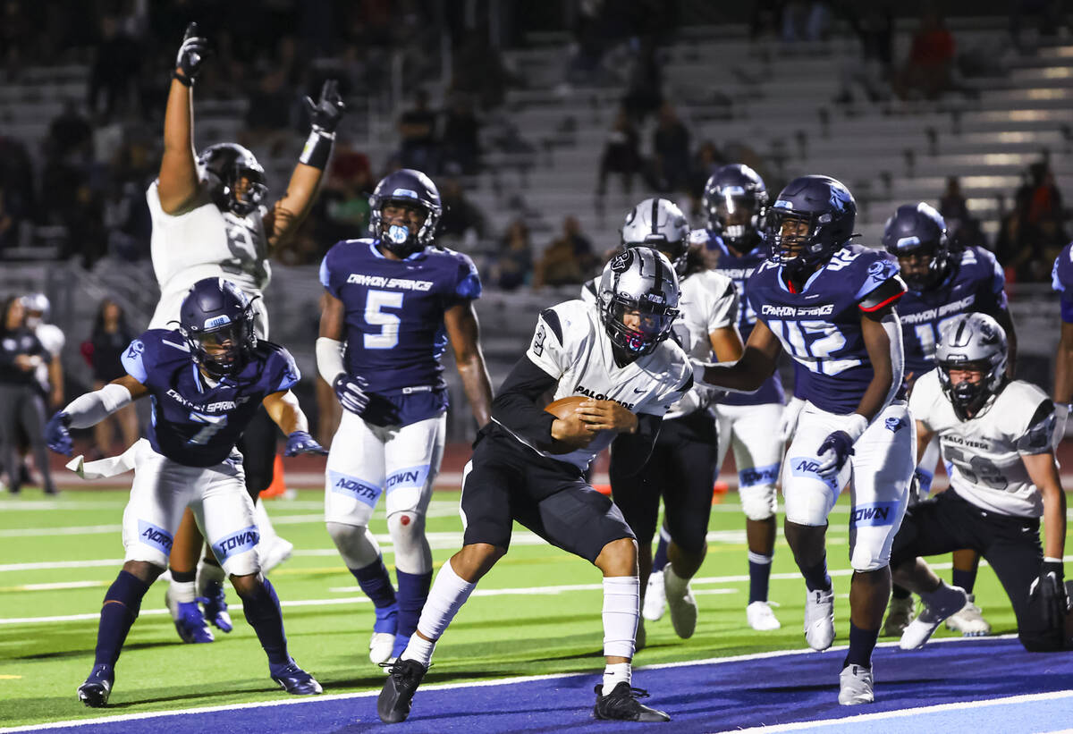 Palo Verde's Paisley Nickelson (2) scores a touchdown during the first half of a football game ...
