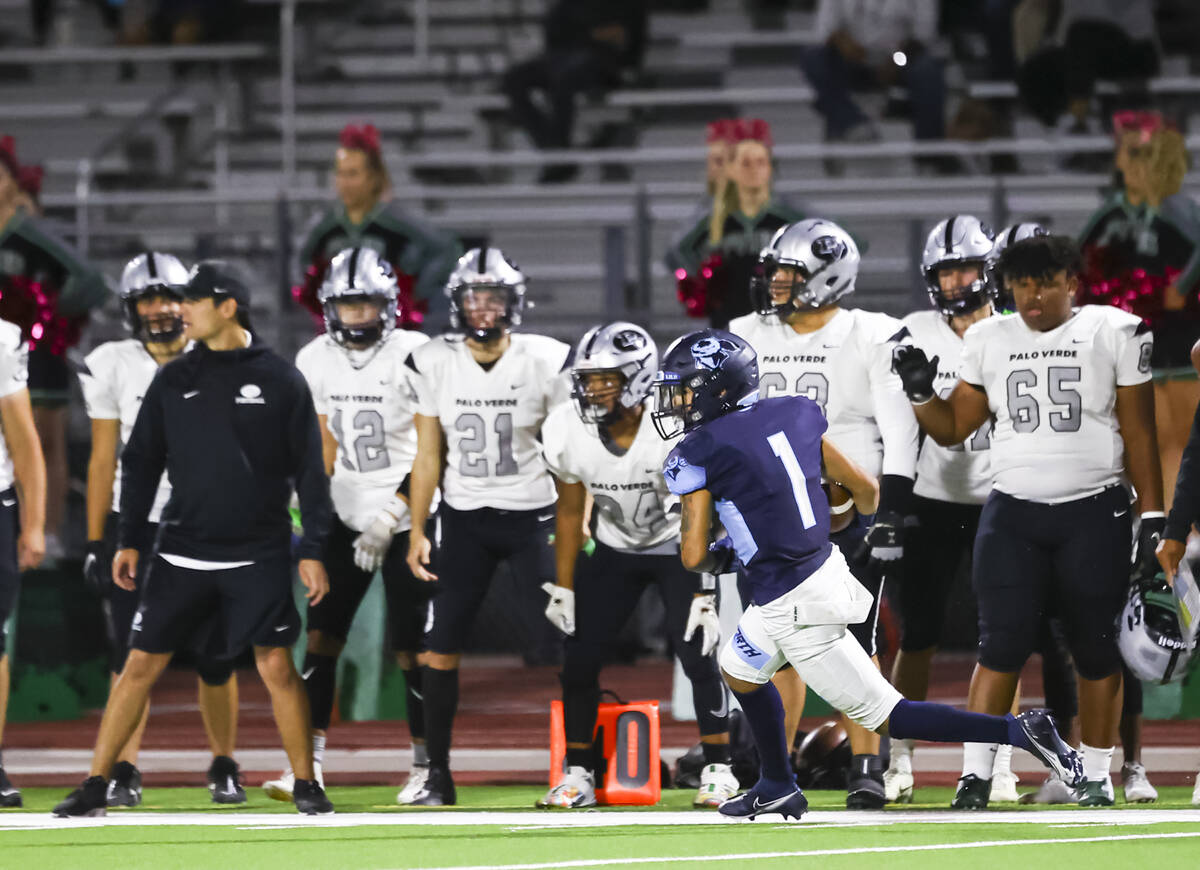 Canyon Springs' Ricardo Pulcher (1) runs the ball during the first half of a football game at C ...