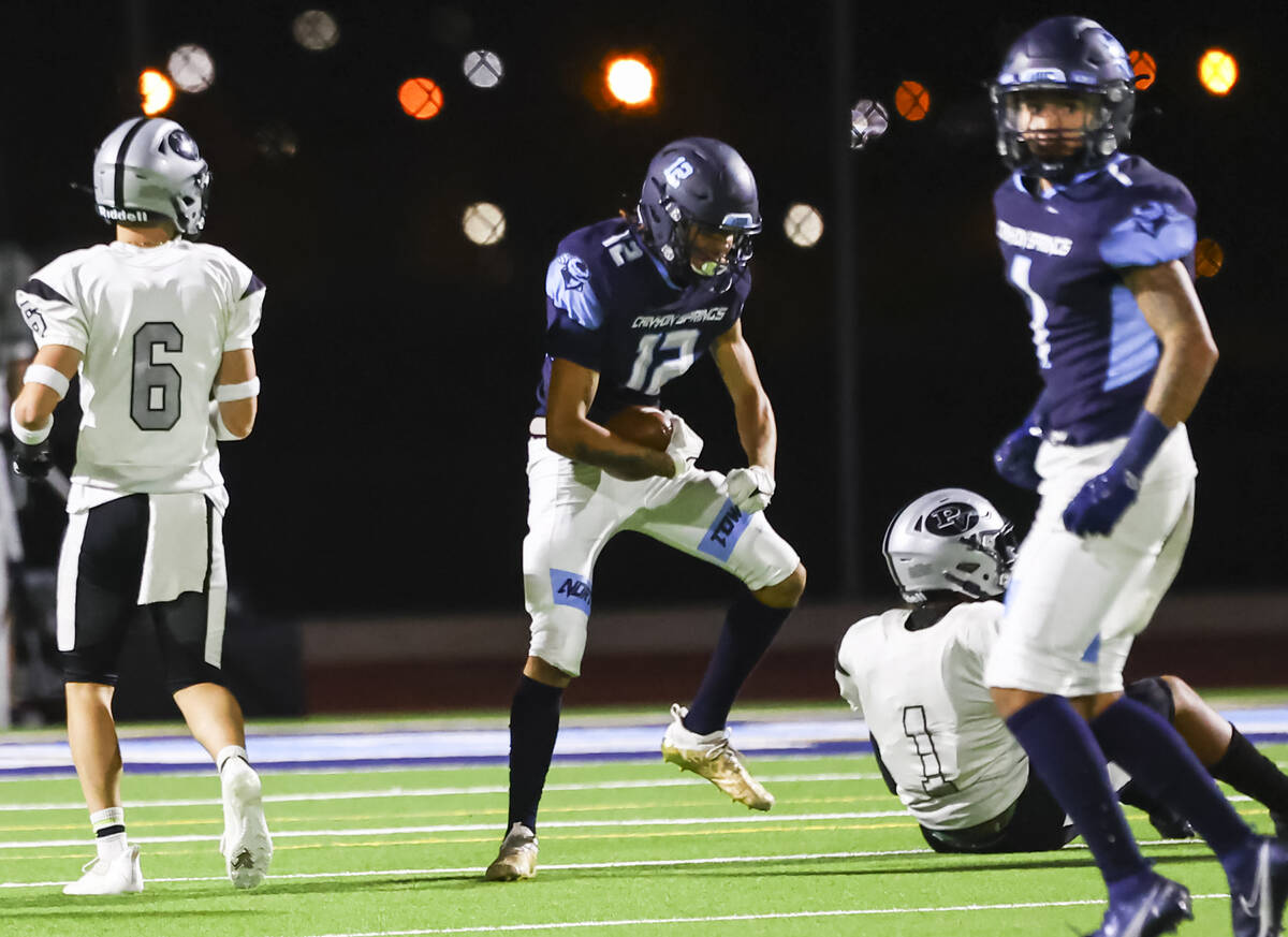 Canyon Springs' Lackawanna Caston (12) celebrates after a play against Palo Verde during the fi ...