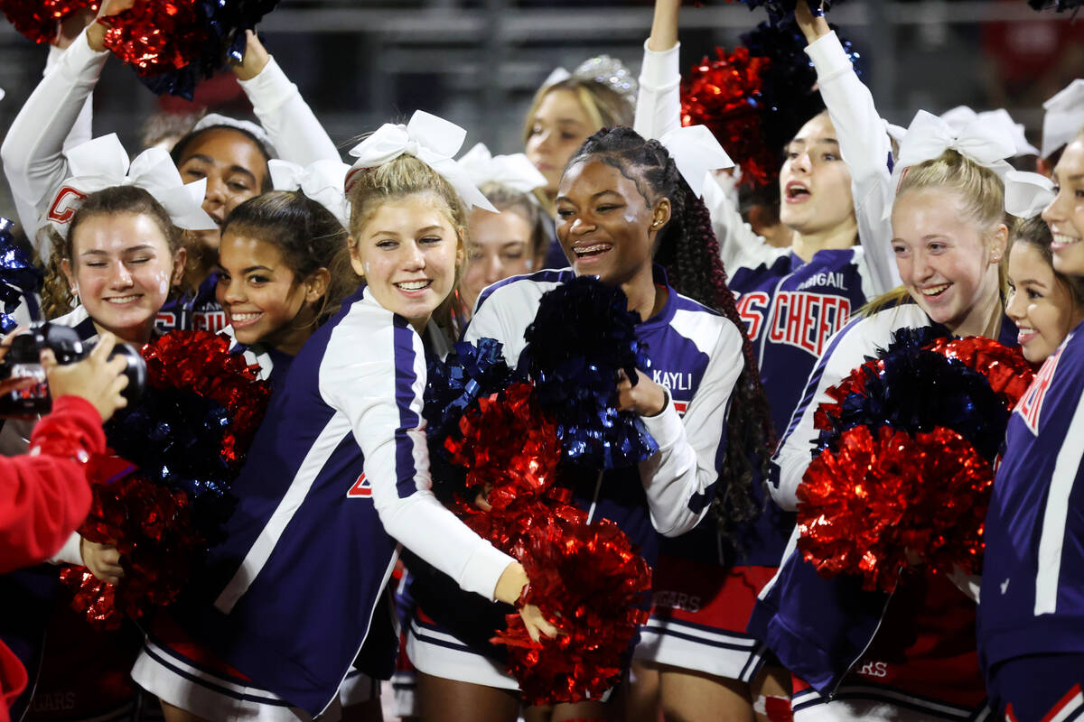 Cheerleaders celebrate after a Coronado win against Shadow Ridge 25-21 in a football game at Co ...