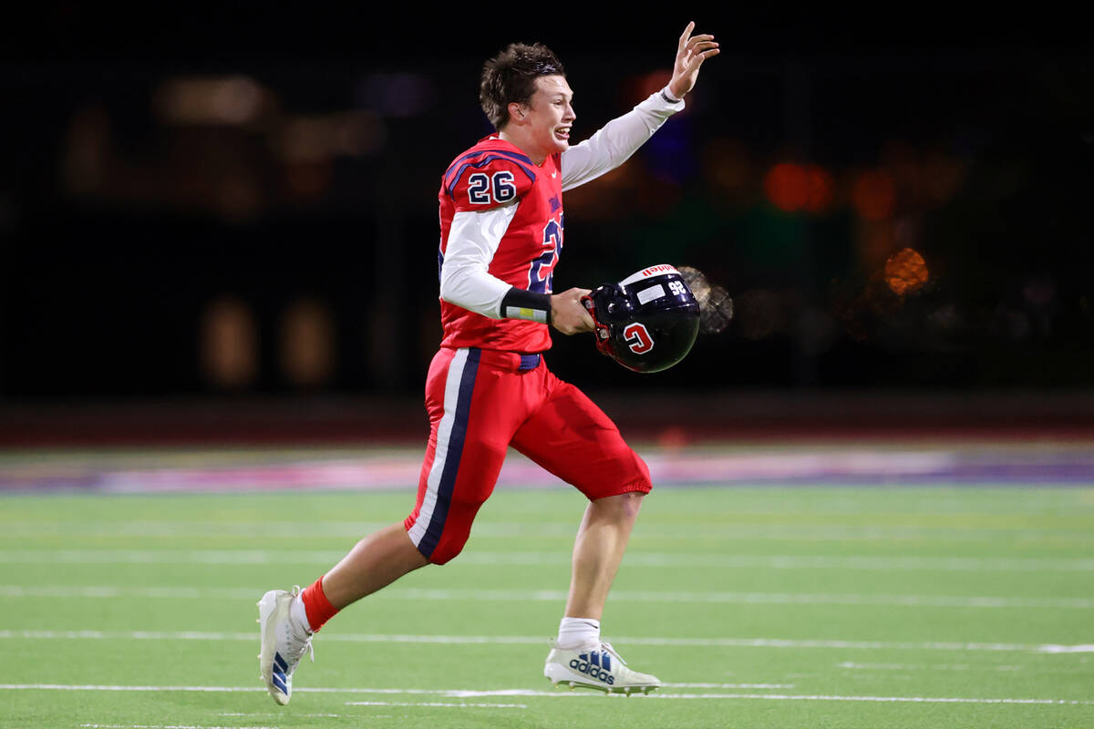 Coronado's Logan Chaney (26) celebrates after his team recovered a fumble to win the game in th ...