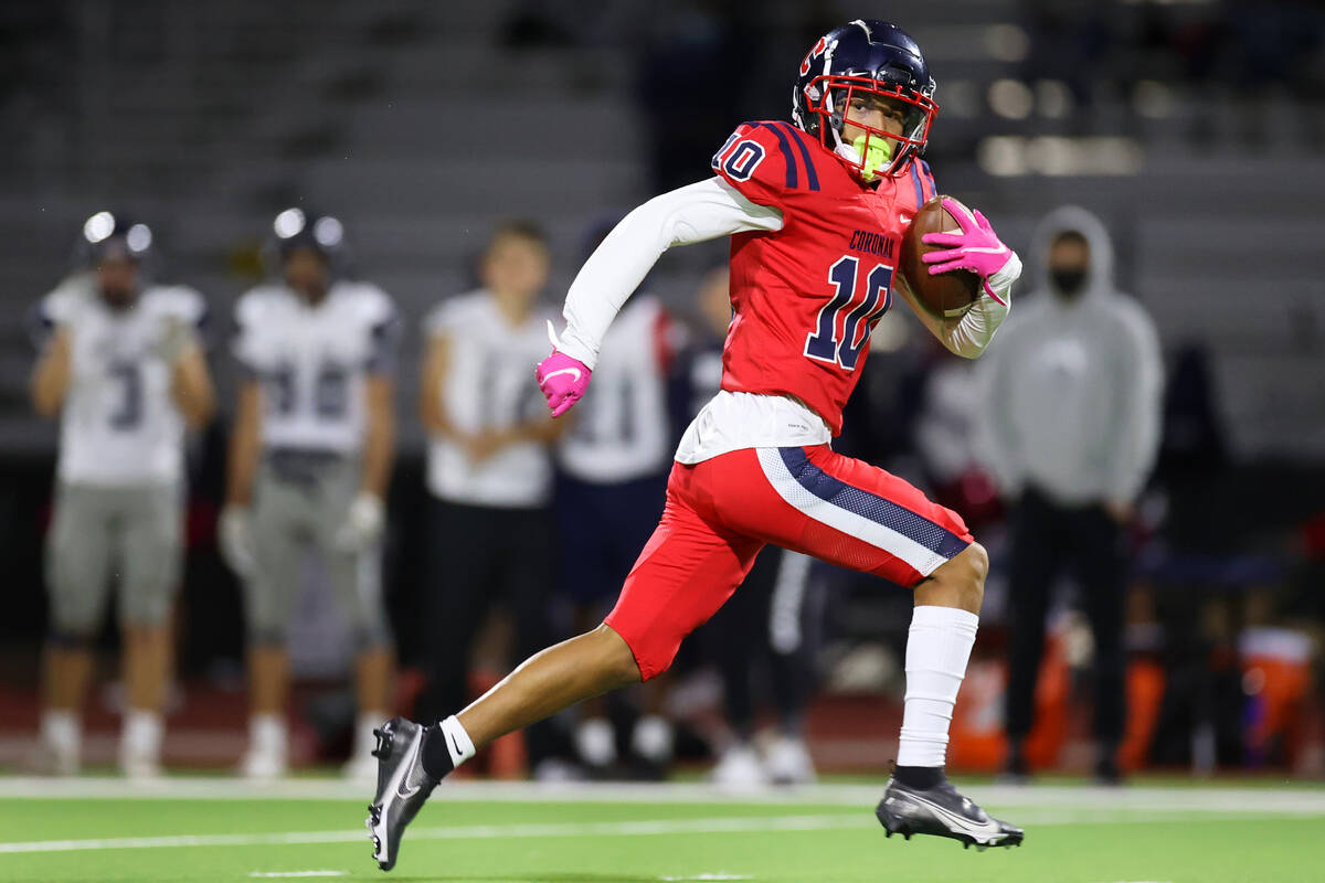 Coronado's Jaylen Garrison (10) runs the ball after a catch for a touchdown against Shadow Ridg ...