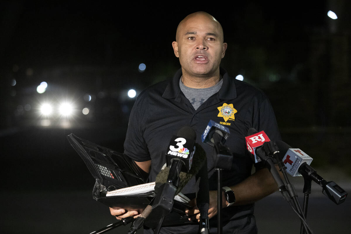 Lt. Ray Spencer gives a media briefing as Las Vegas police investigate a homicide in the 2050 b ...