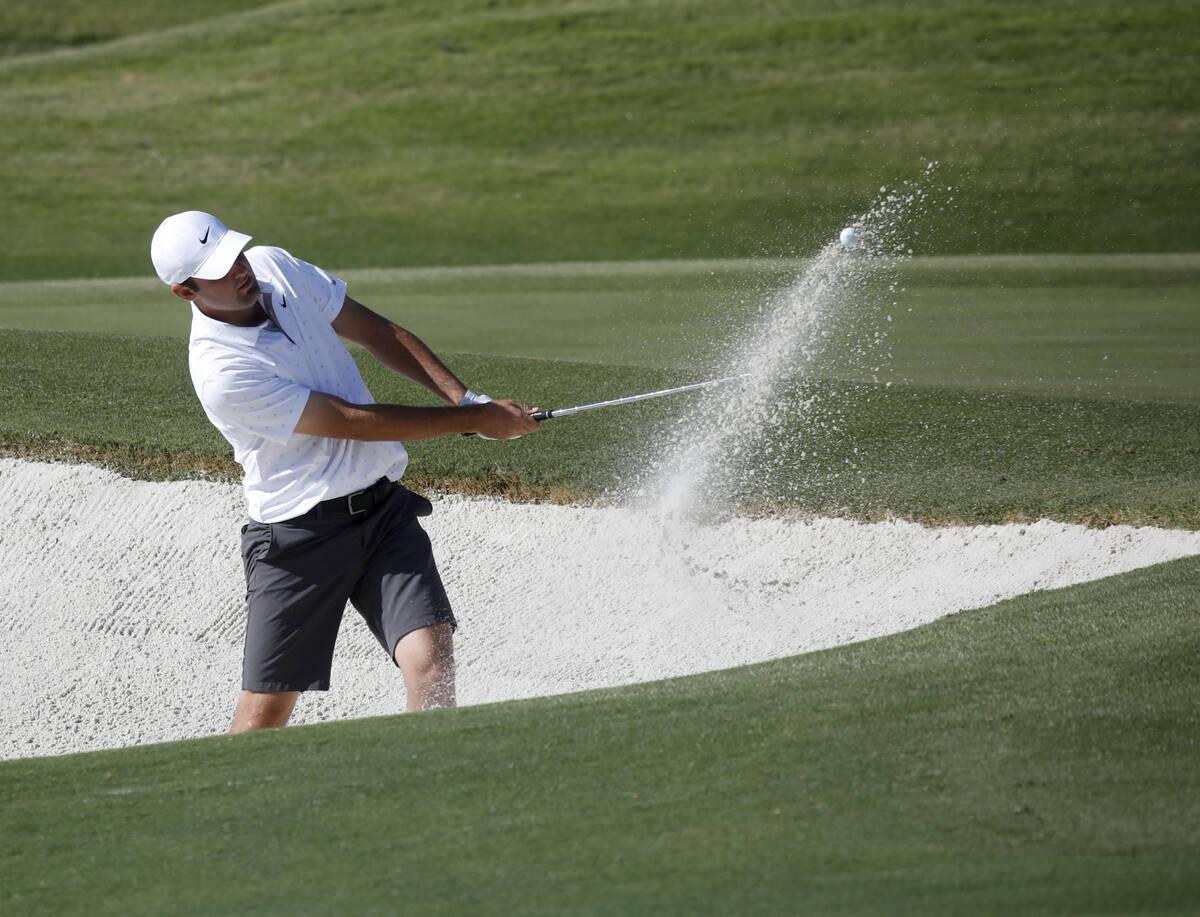 Scottie Scheffler hits out of a bunker on the ninth hole during the Shriners Childrenճ O ...