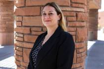 Melanie Rouse poses for a photo outside of the Clark County Government Center building after be ...