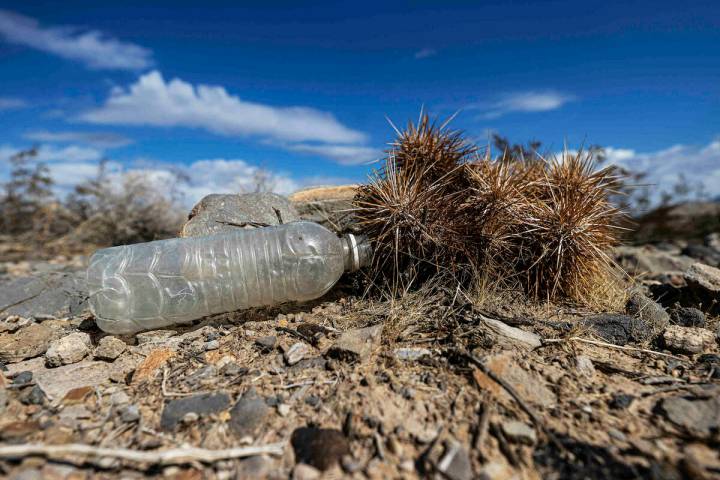 An empty water bottle in a vacant field on Saturday, Oct. 9, 2021, in Las Vegas. (Benjamin Hage ...