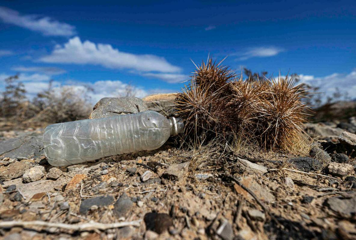 An empty water bottle in a vacant field on Saturday, Oct. 9, 2021, in Las Vegas. (Benjamin Hage ...