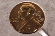 FILE - A Tuesday, Dec. 8, 2020 file photo of a Nobel medal displayed during a ceremony in New Y ...