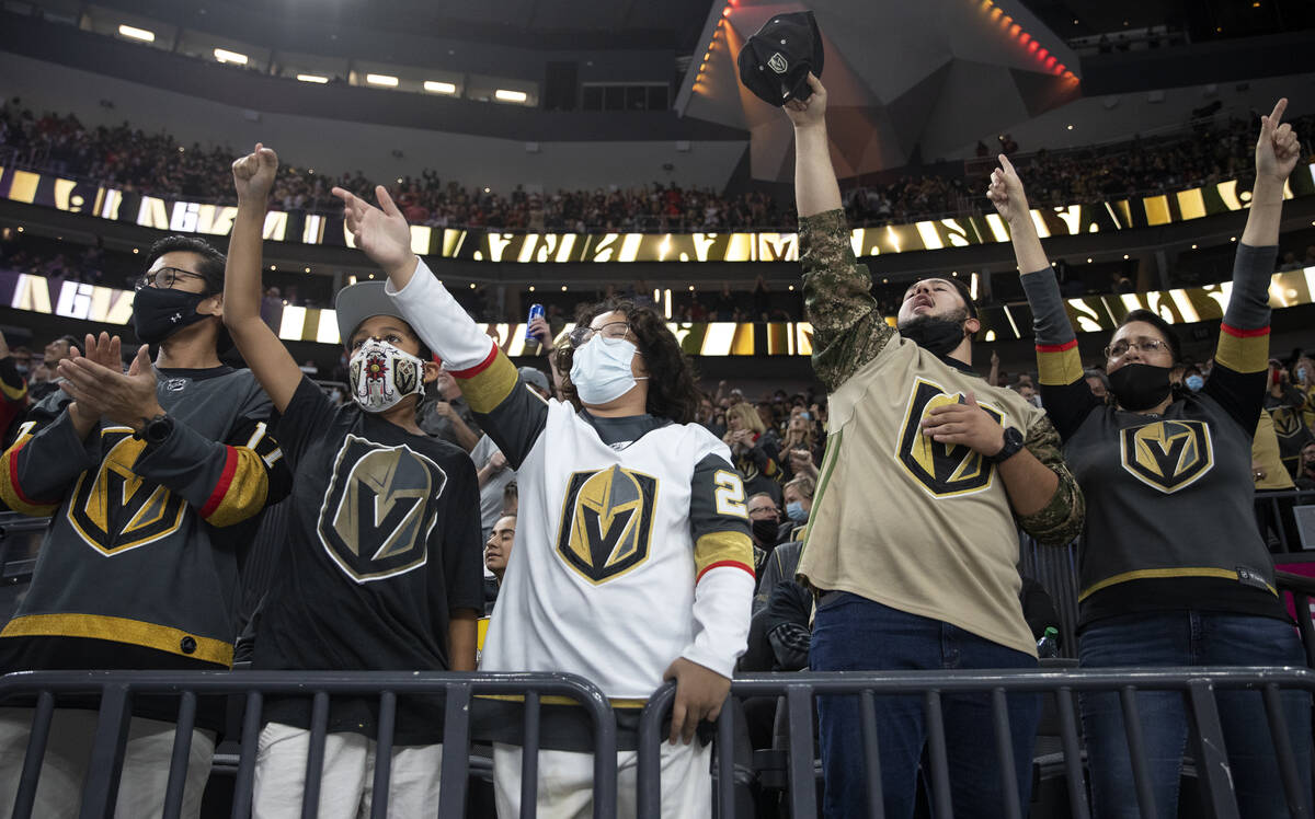 From left, Marvin Barque, David Aroche, Dominic Barque, Alex Beraja and Lisa Burgess cheer afte ...