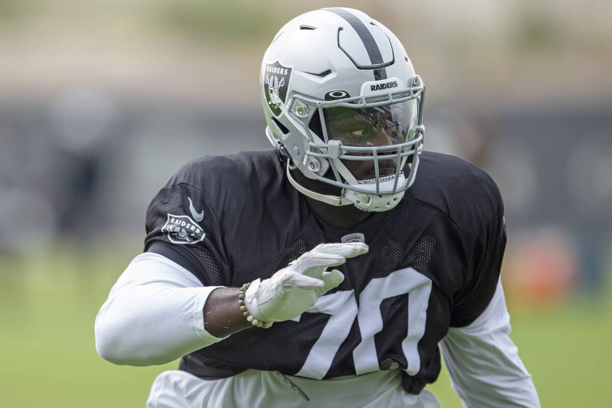 Raiders offensive tackle Alex Leatherwood (70) drills during a practice session at the Raiders ...