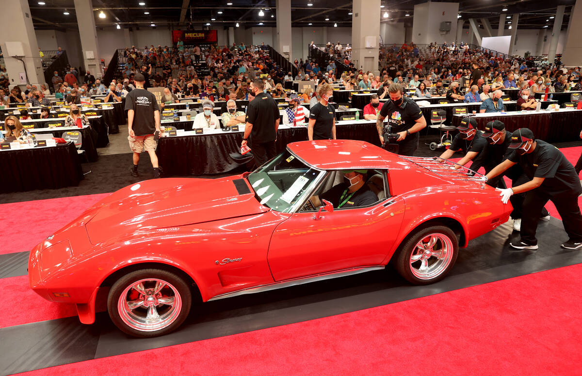 Bidders check out a 1975 Chevrolet Corvette during Mecum Las Vegas auction at the Las Vegas Con ...