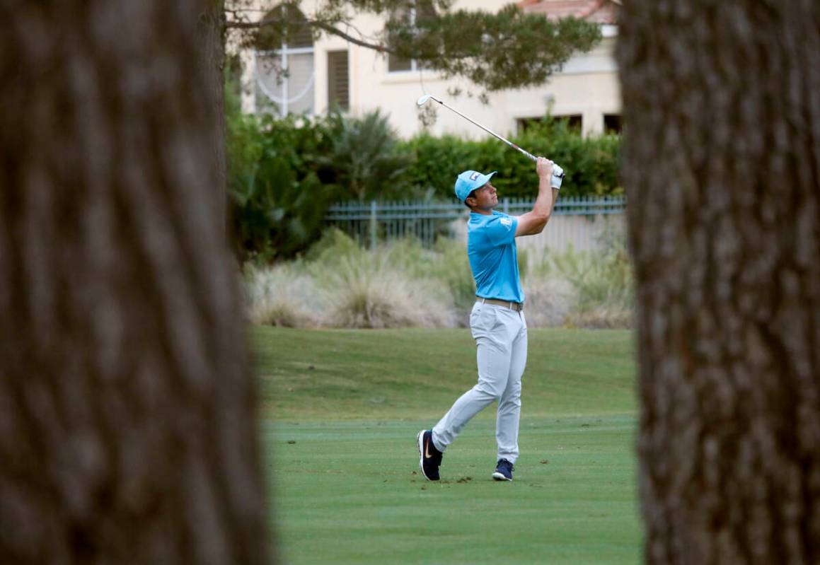 Viktor Hovland hits from the fairway on the 10th hole during the first round of the Shriners Ho ...