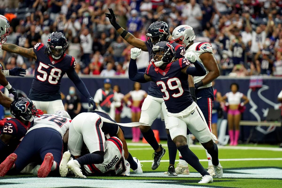 Houston Texans cornerback Terrance Mitchell (39) celebrates after forcing a fumble by the New E ...