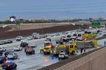 A Clark County fire truck has overturned on the 215 Beltway. (Glenn Puit/Las Vegas Review-Journal)