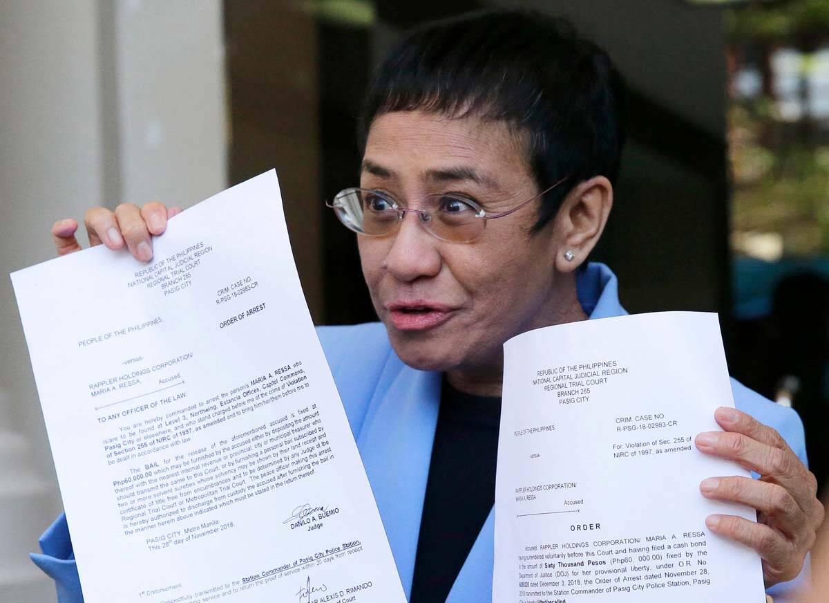 In this Dec. 3, 2018 file photo, Maria Ressa, CEO of Rappler, an online news service, who has b ...
