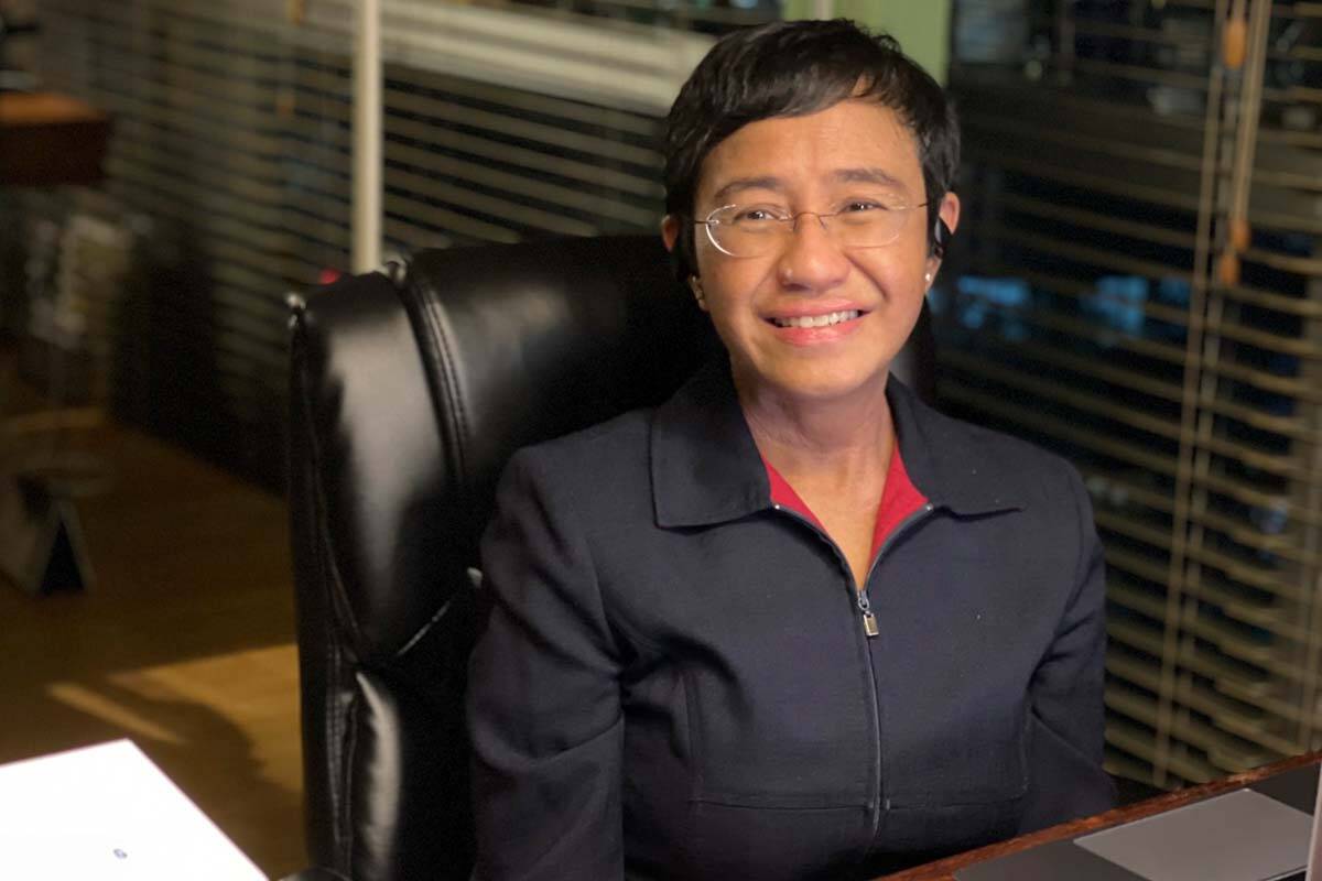 In this photo provided by the Rappler, Rappler CEO and Executive Editor Maria Ressa reacts afte ...