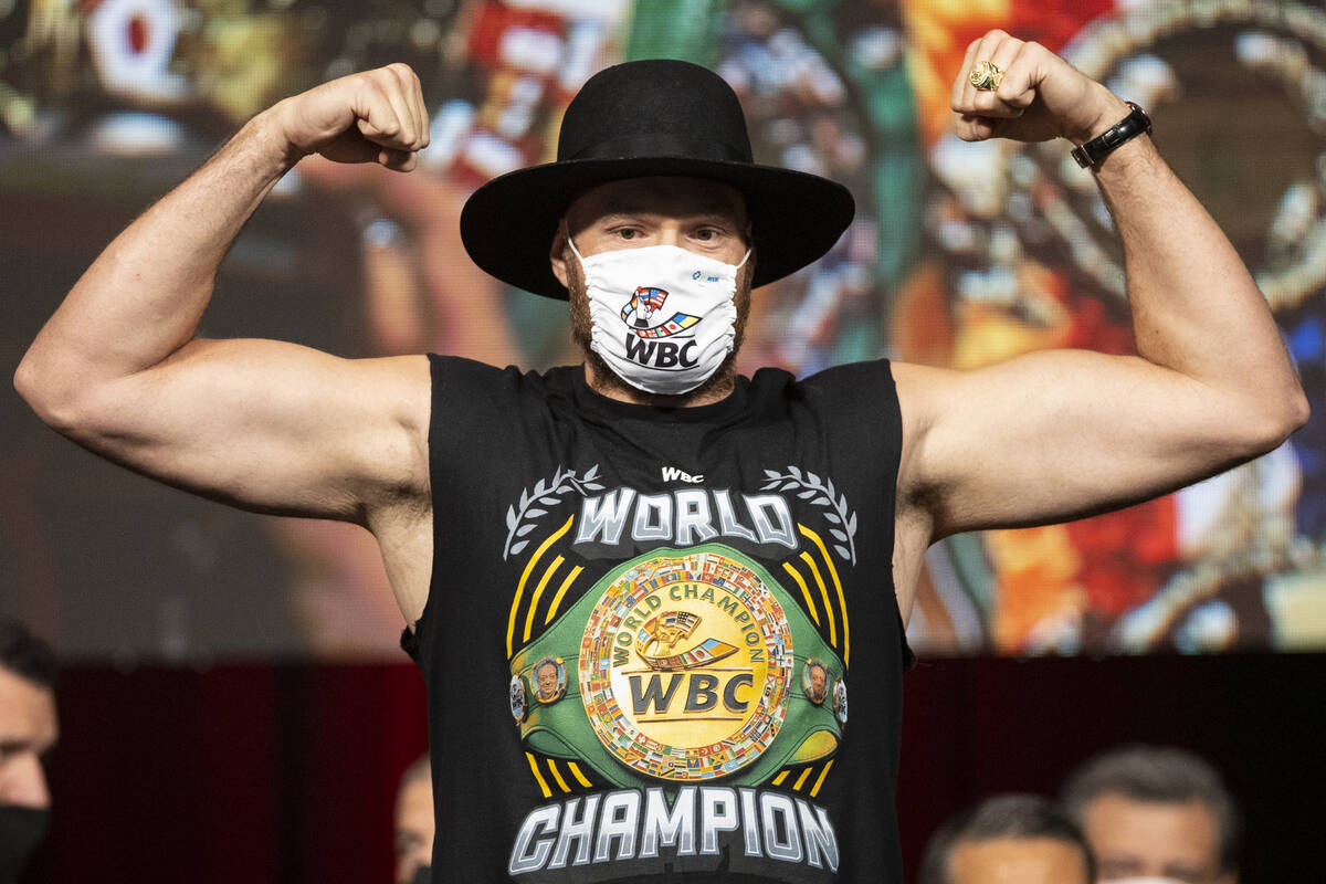 Tyson Fury poses during a weigh-in event at the MGM Grand Garden Arena in Las Vegas, Friday, Oc ...