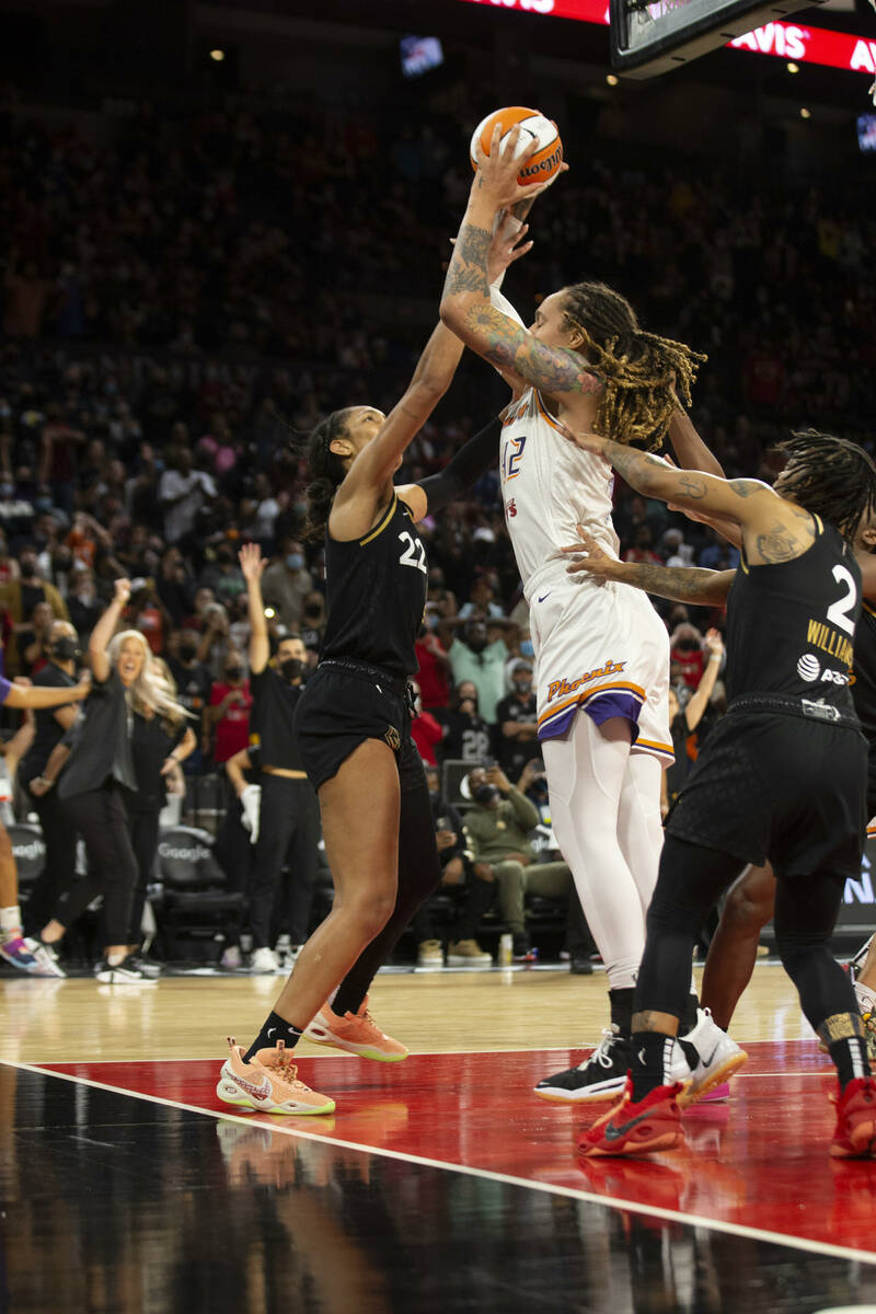 Las Vegas Aces forward A'ja Wilson (22) tries to take away the basketball from Phoenix Mercury ...