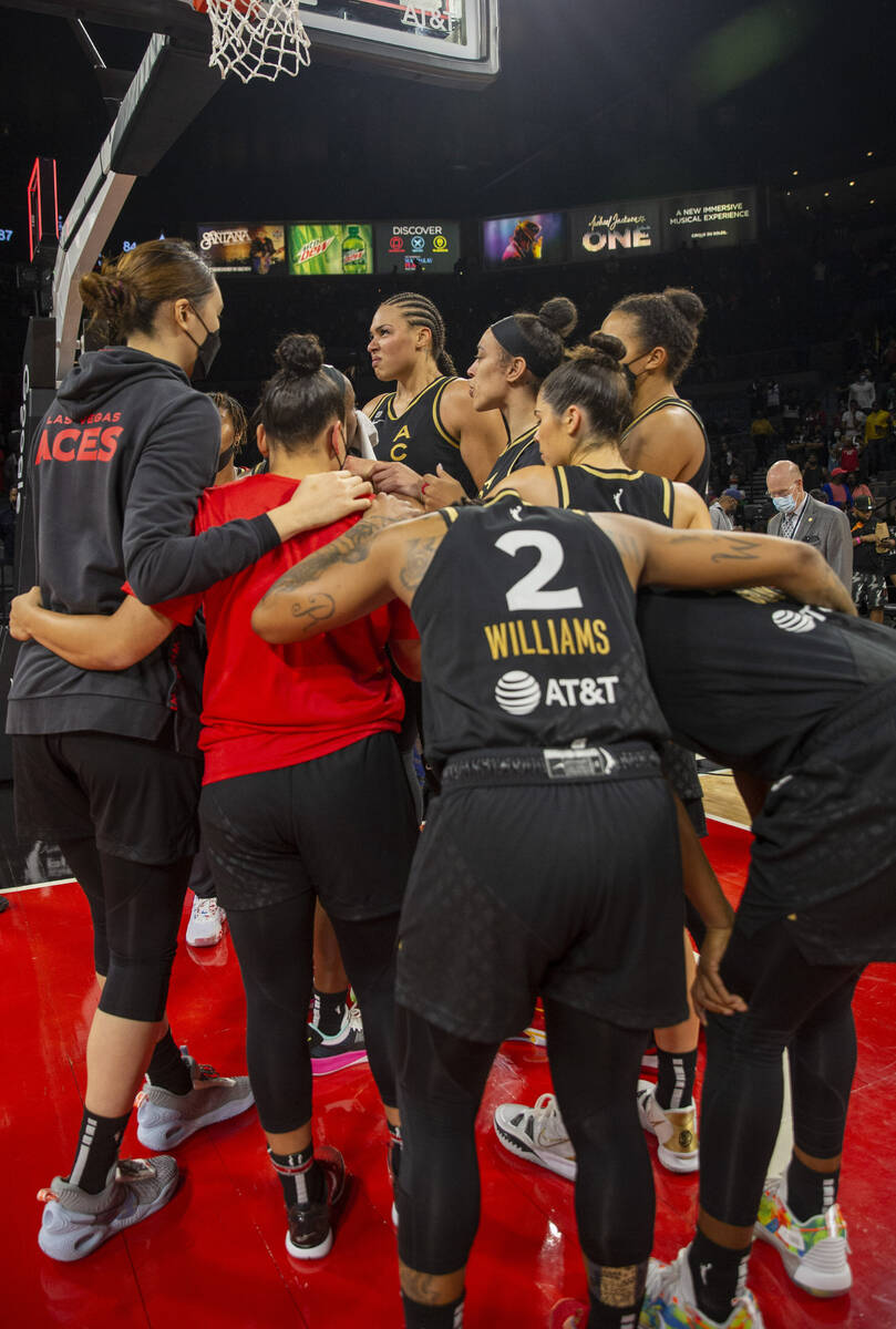Las Vegas Aces players share an emotional moment at the Michelob Ultra Arena after losing Game ...