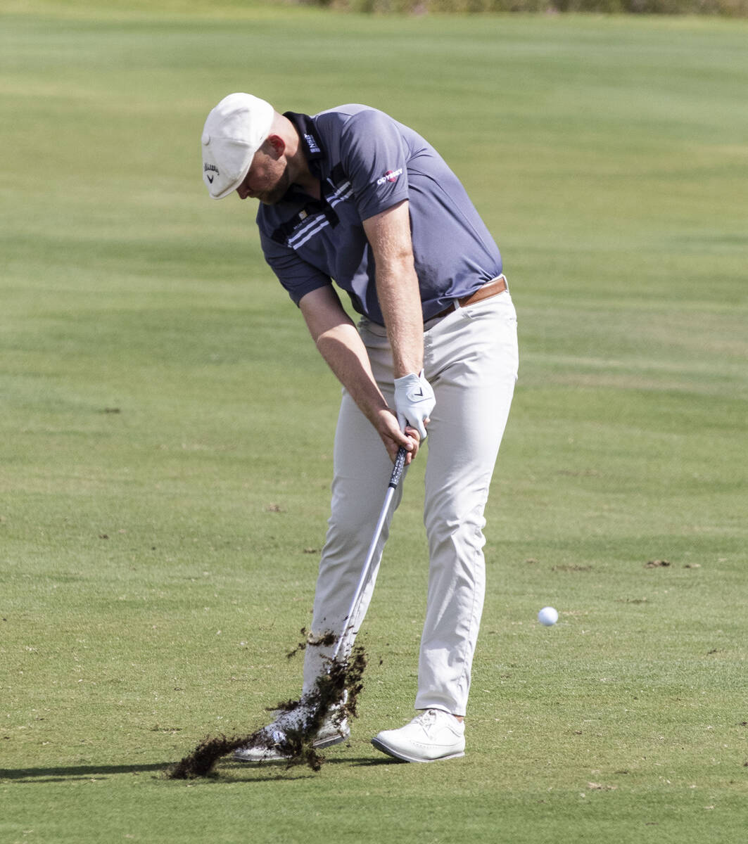 Harry Hall of England hits from the fairway on the 18th hole during the second round of the Shr ...