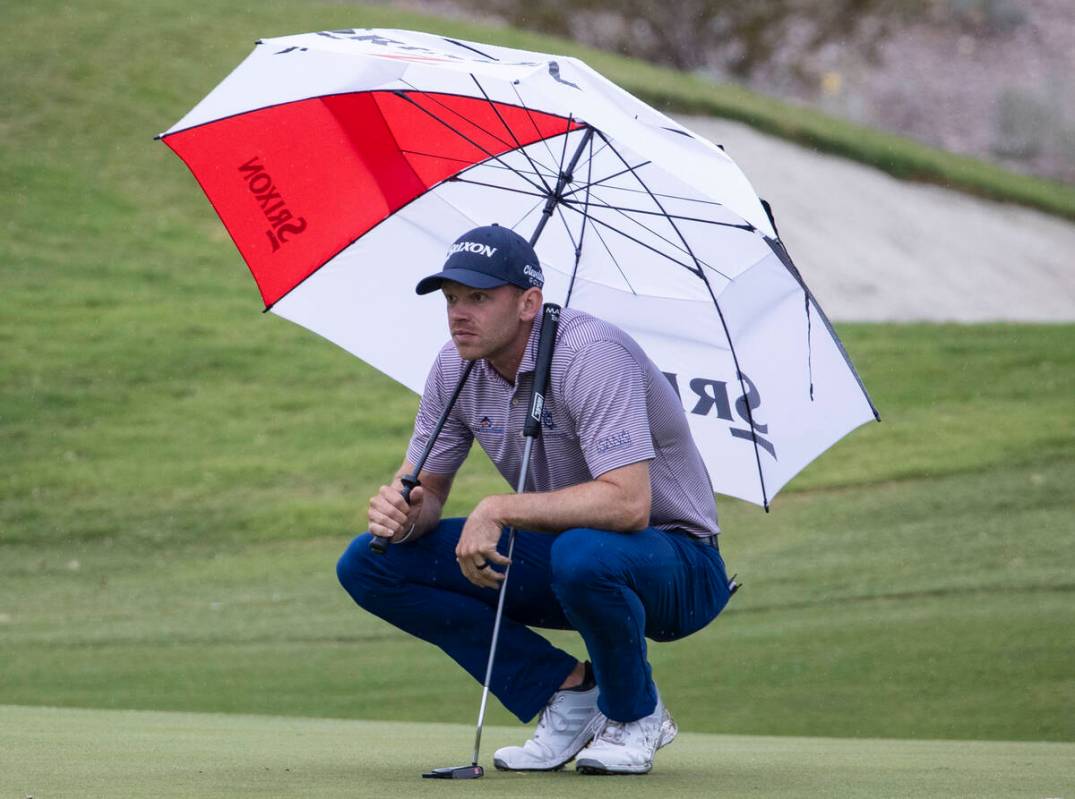Jared Wolfe of Ponte Verde, Fla., lines up a putt at the 10th hole during the second round of t ...