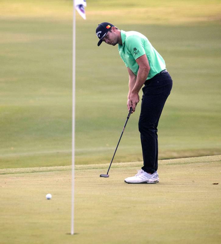 Sam Burns of Shreveport, La., makes his putt at the 18th hole during the second round of the Sh ...