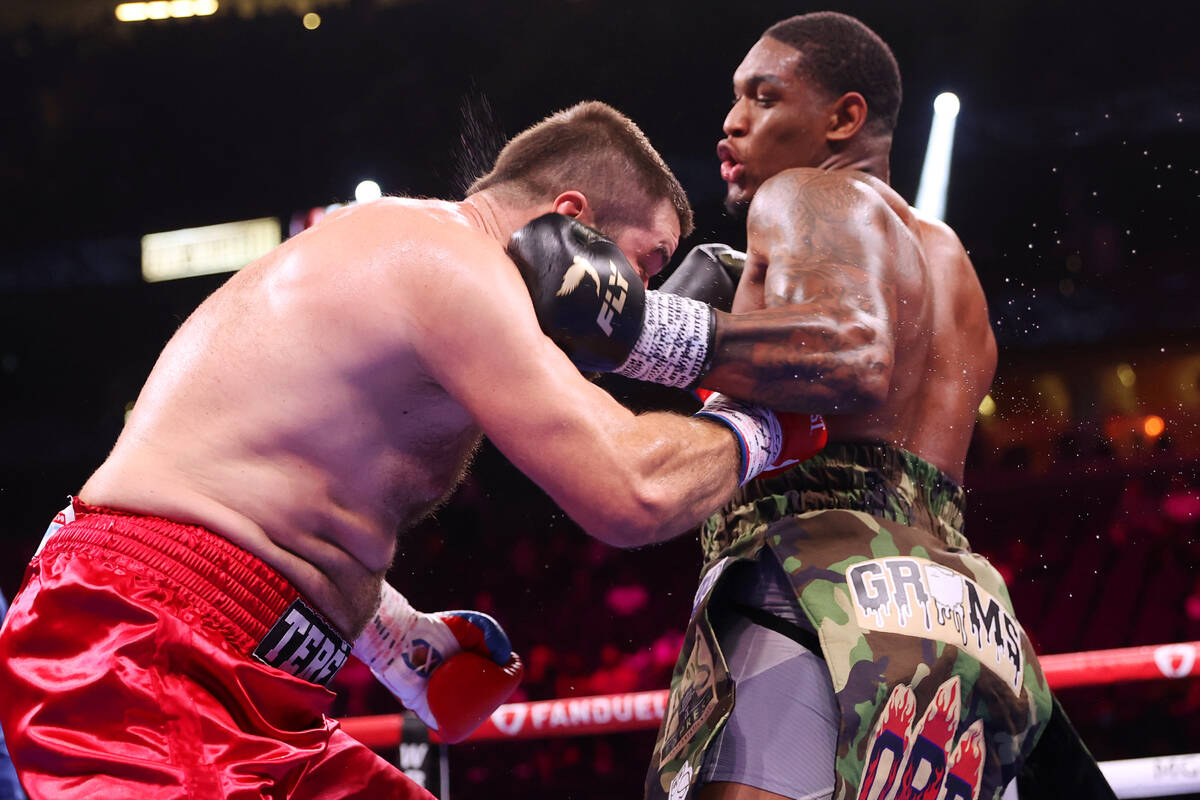 Jared Anderson, right, connects a punch against Vladimir Tereshkin in the second round of a hea ...