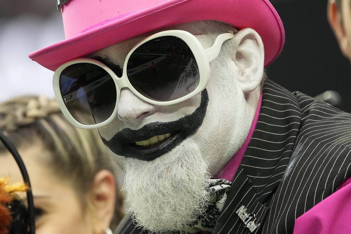 A fan watches during the first half of an NFL football game between the Las Vegas Raiders and t ...
