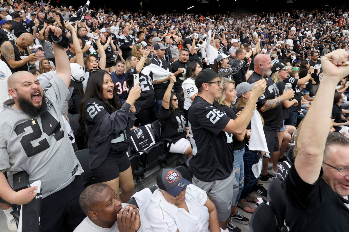 Fans cheer as the Raiders take on the Chicago Bears at Allegiant Stadium in Las Vegas Sunday, O ...