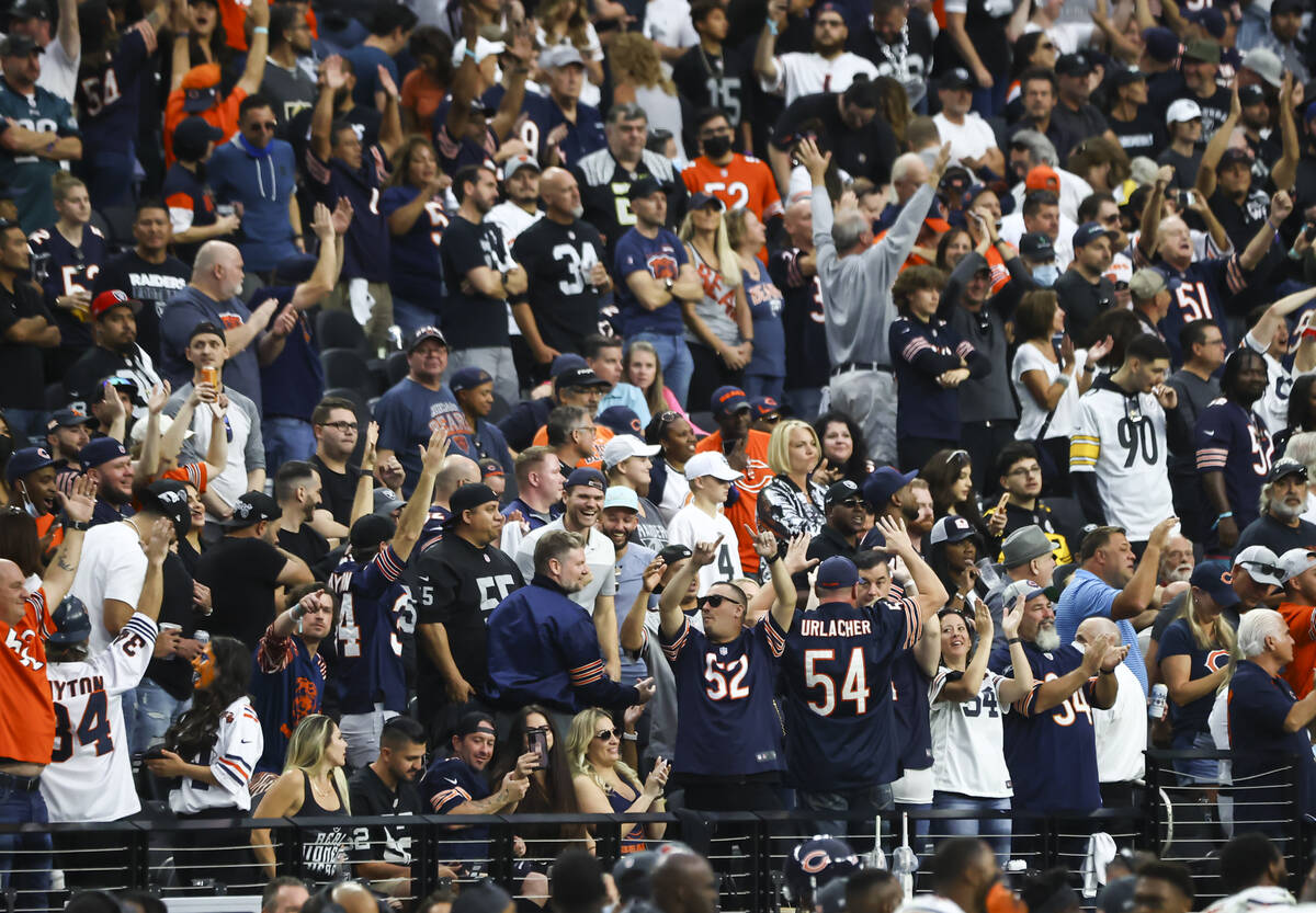 Chicago Bears fans celebrate as their team defeats the Raiders during the second half of an NFL ...