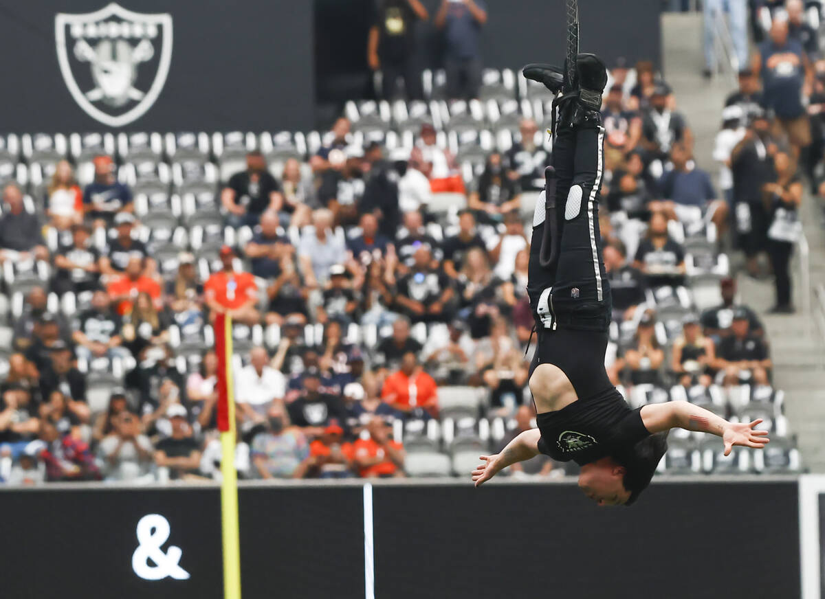 Magician and "Mindfreak" star Criss Angel, who was dangling over 100 feet in the air ...