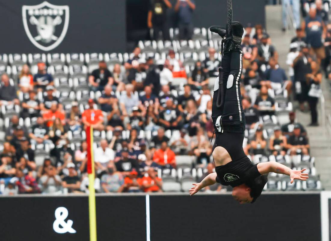 Magician and "Mindfreak" star Criss Angel, who was dangling over 100 feet in the air ...