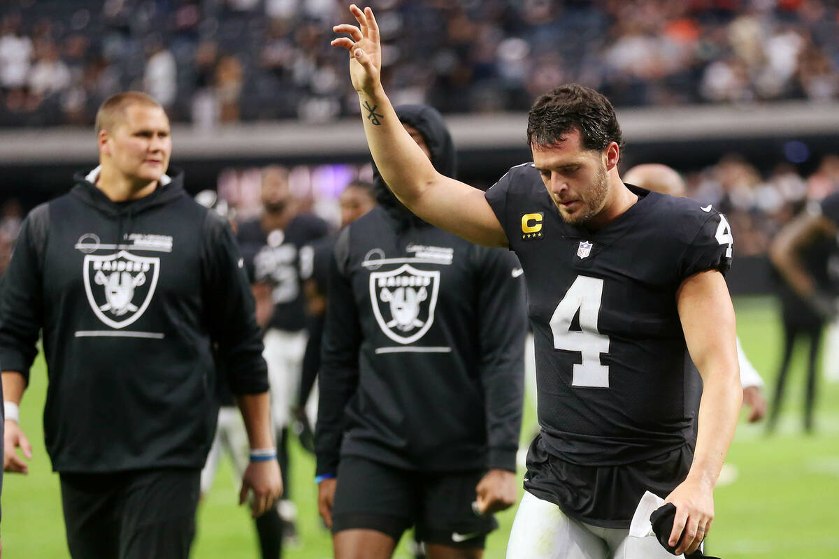 Raiders quarterback Derek Carr (4) leaves the field after his team's loss against the Chicago B ...