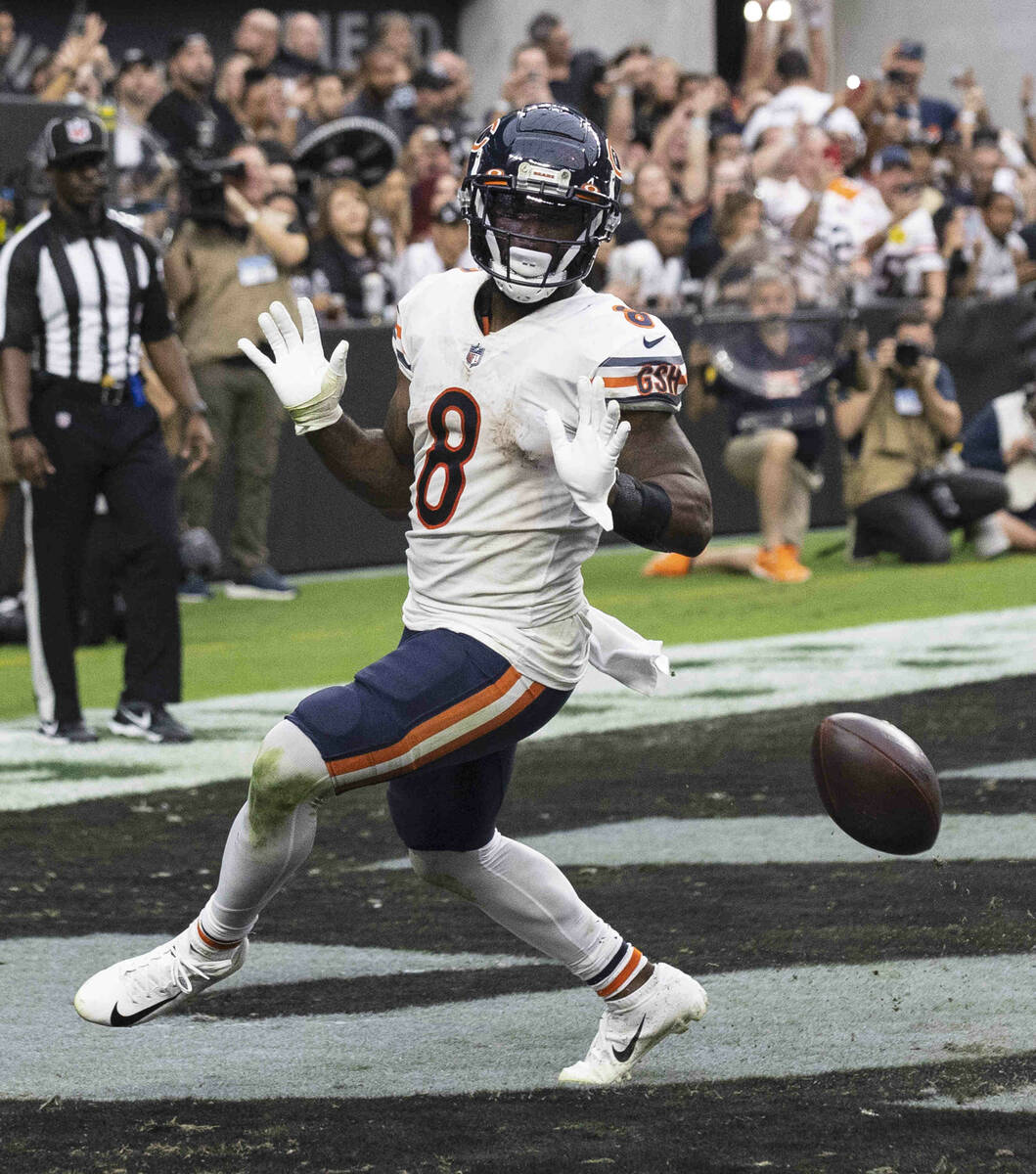 Chicago Bears running back Damien Williams (8) celebrates his touchdown against the Raiders dur ...