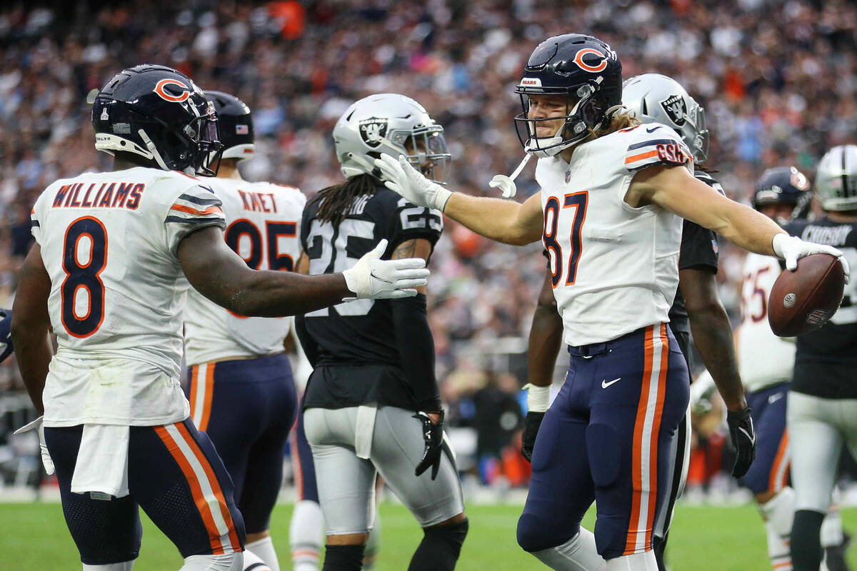 Chicago Bears tight end Jesper Horsted (87) celebrates his touchdown with running back Damien W ...