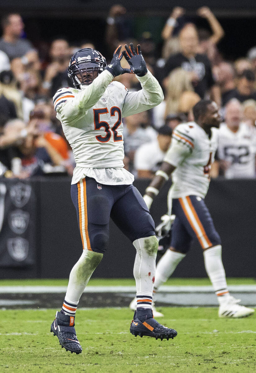 Chicago Bears outside linebacker Khalil Mack (52) celebrates a big  defensive play in the second …