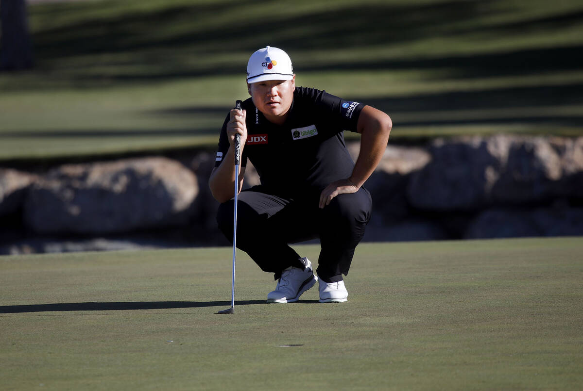 Sungjae Im lines up a putt on the 16th green during the final round of the Shriners Hospitals f ...