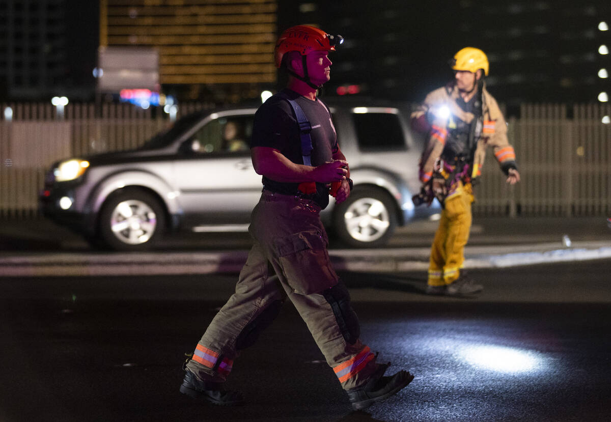 Las Vegas Fire & Rescue respond to people trapped in an elevator during a power outage near ...
