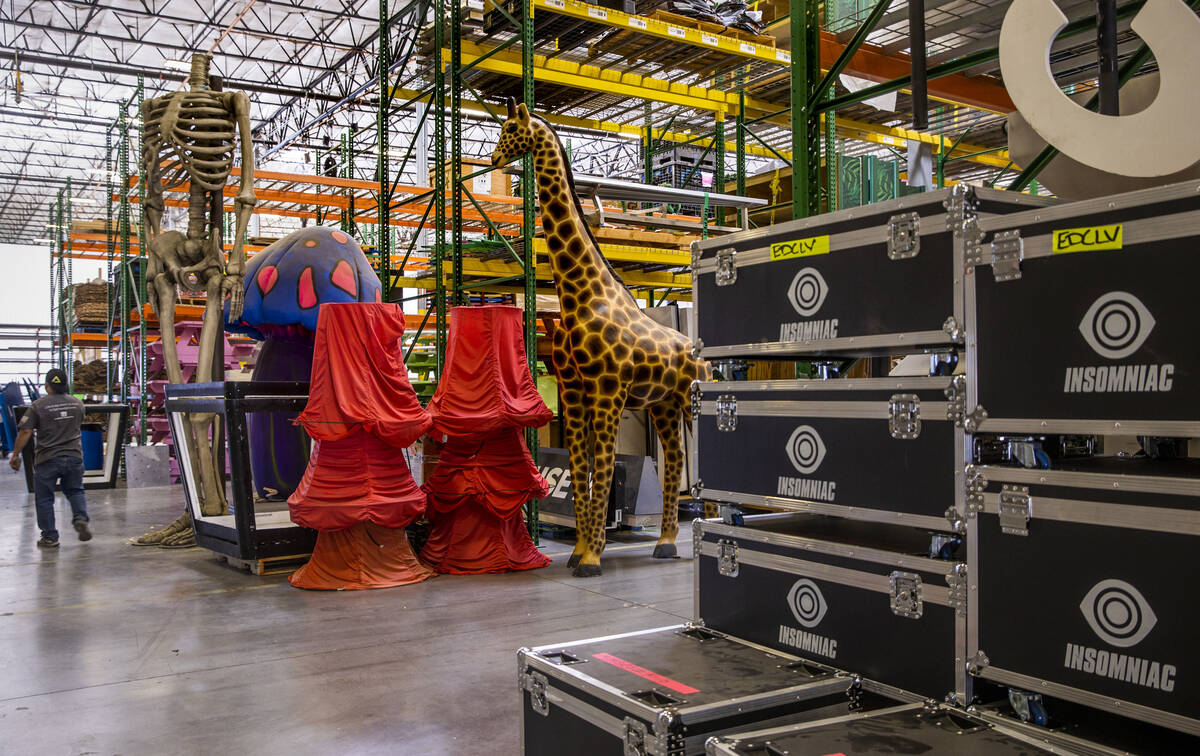 Travel cases are stacked and ready to transport items with set pieces about at the Electric Dai ...