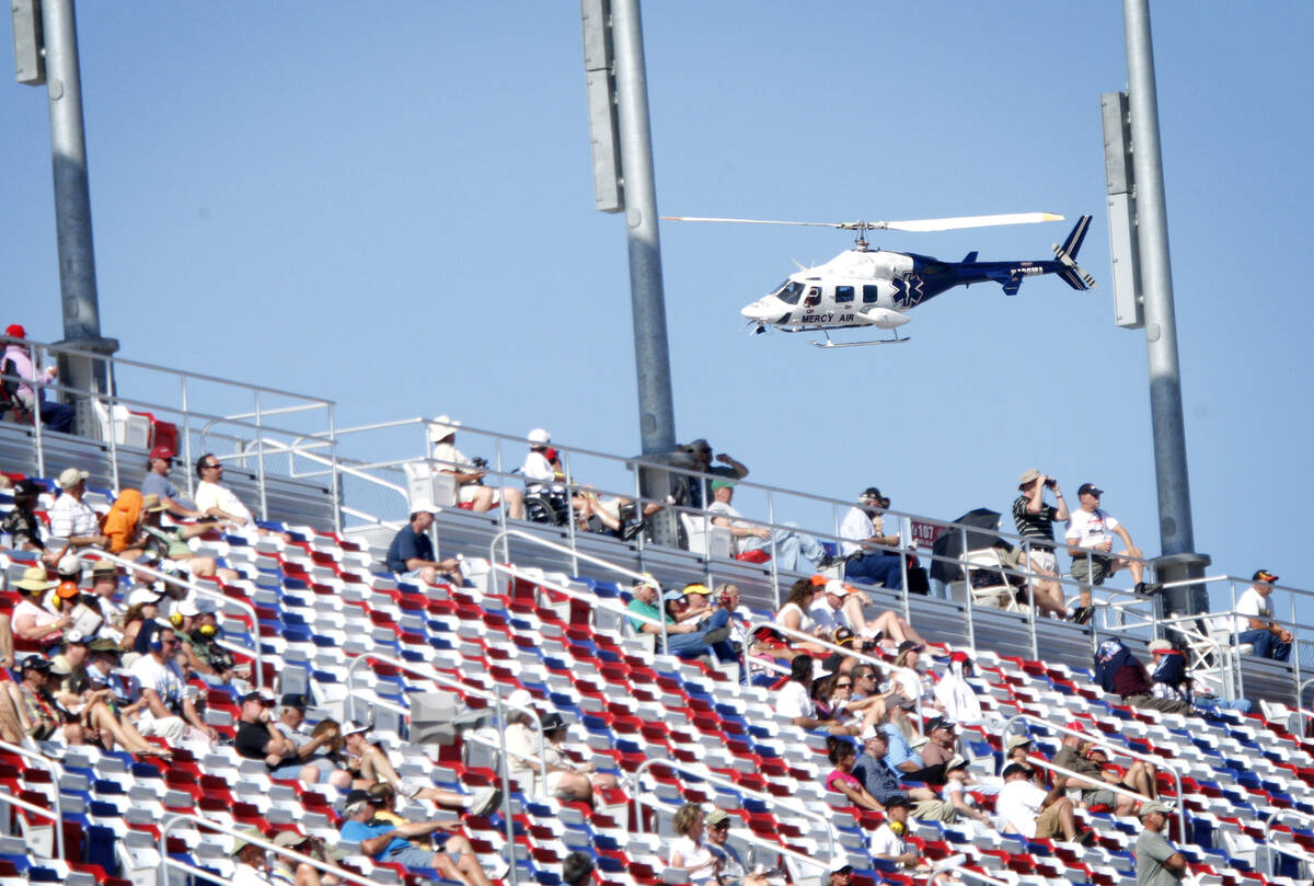 JESSICA EBELHAR/LAS VEGAS REVIEW-JOURNAL IndyCar driver Dan Wheldon is transported by helicopt ...