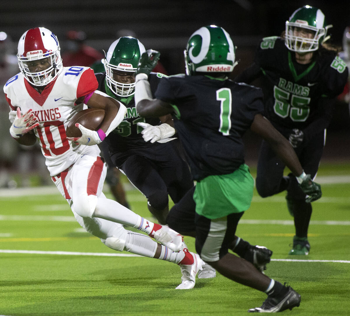 Valley's wide receiver DeAndre Gholar (10) attempts to swerve a tackle by Rancho's defensive ba ...
