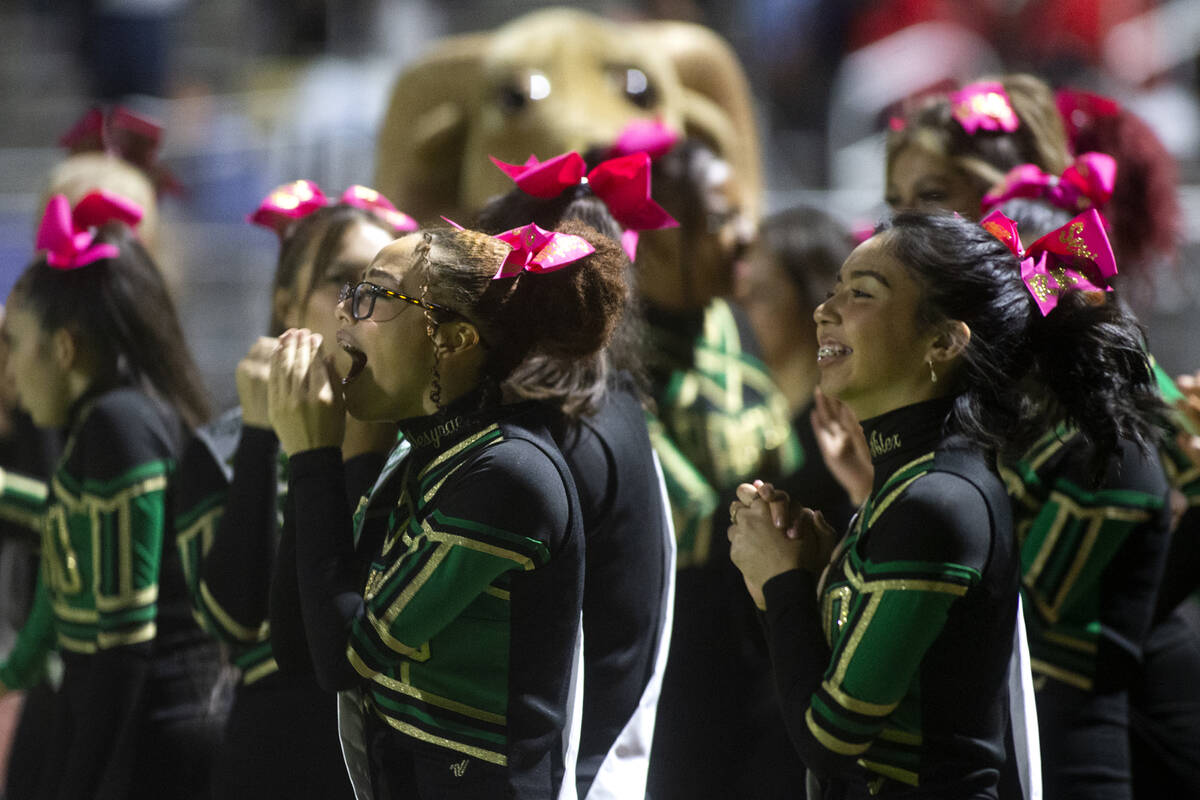 Rancho's cheerleading squad cheers for their team as they take the lead during the first half o ...