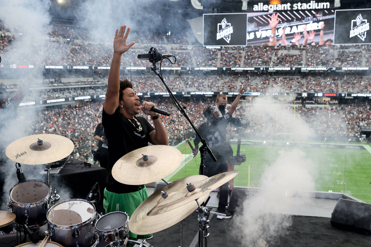 Ludacris performs during halftime as the Raiders take on the Chicago Bears at Allegiant Stadium ...