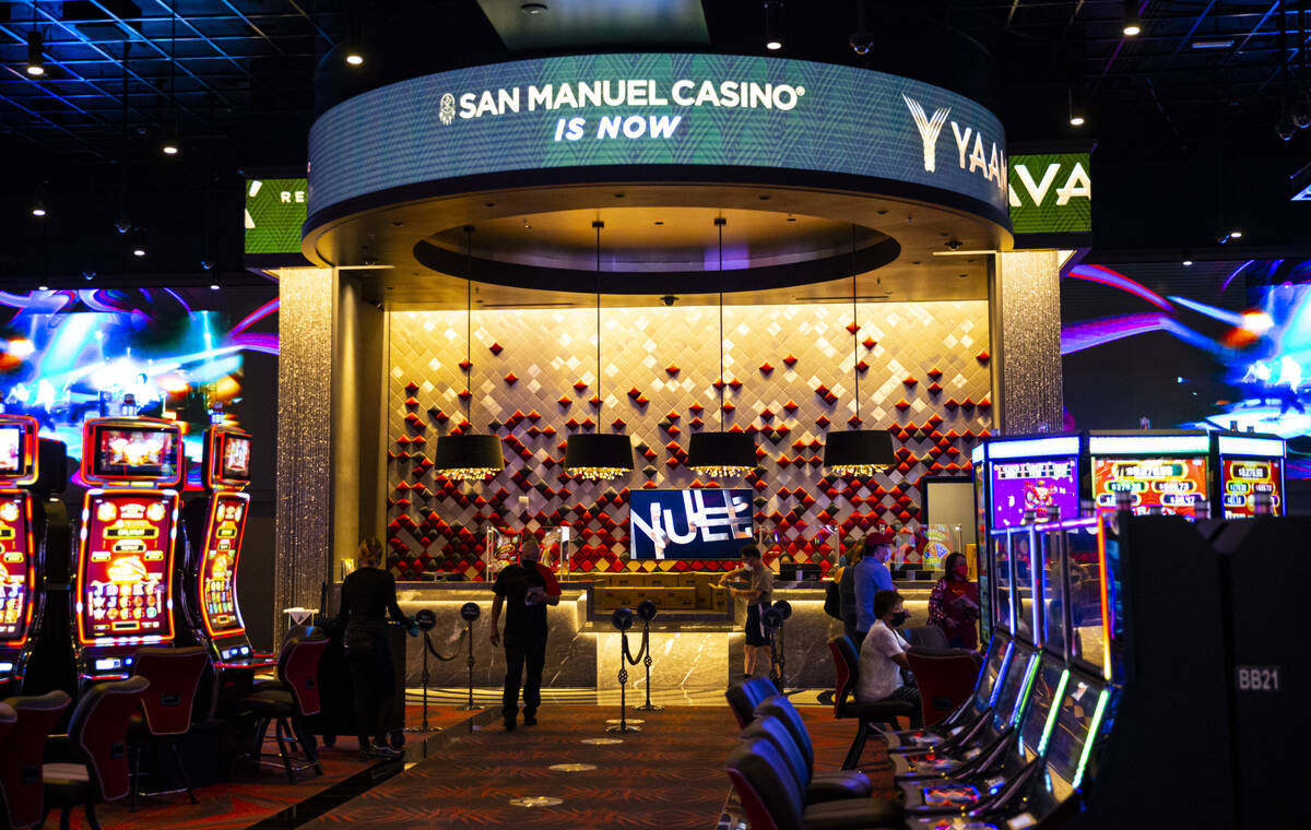 People walk on one of the casino floors during a tour of the Yaamava' Resort & Casino, form ...