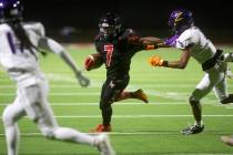 Las Vegas' running back Torrell Harley (7) heads for the end zone as Durango's defensive back J ...